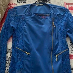 Lace jacket with golden zipper .